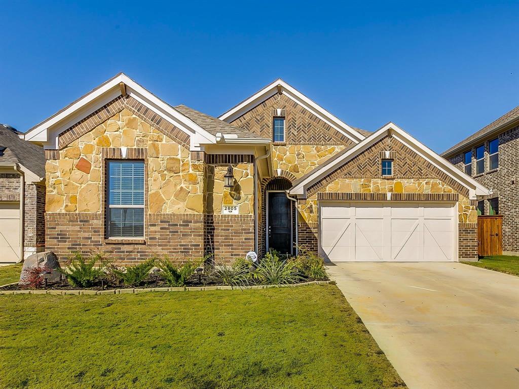 2805 Newsom Ridge Drive Mansfield, TX 76063 - Photo 1 of 33 a view of a house with yard and plants