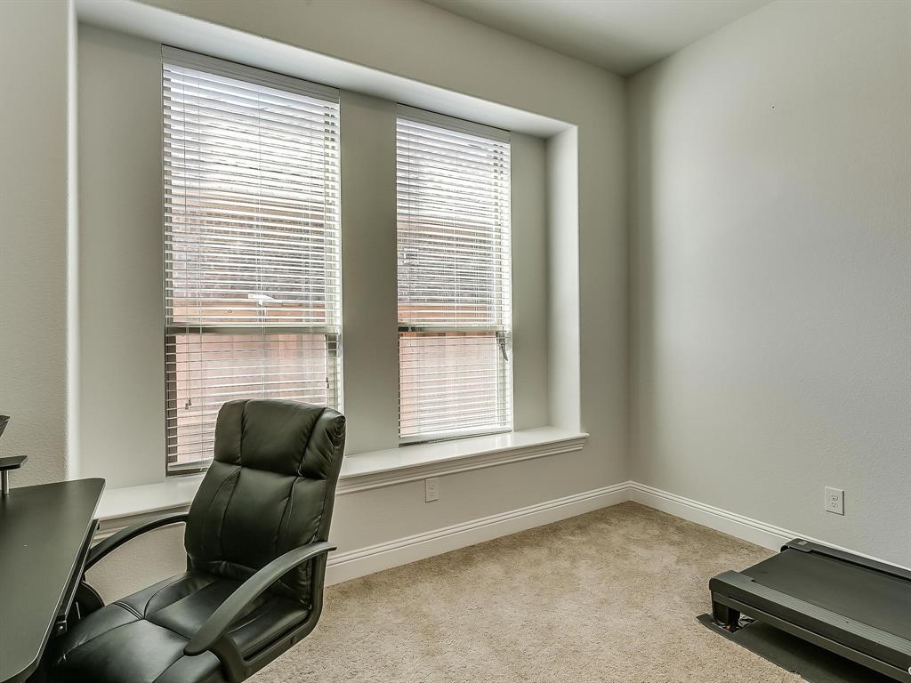 2805 Newsom Ridge Drive Mansfield, TX 76063 - Photo 18 of 33 a living room with furniture and a window