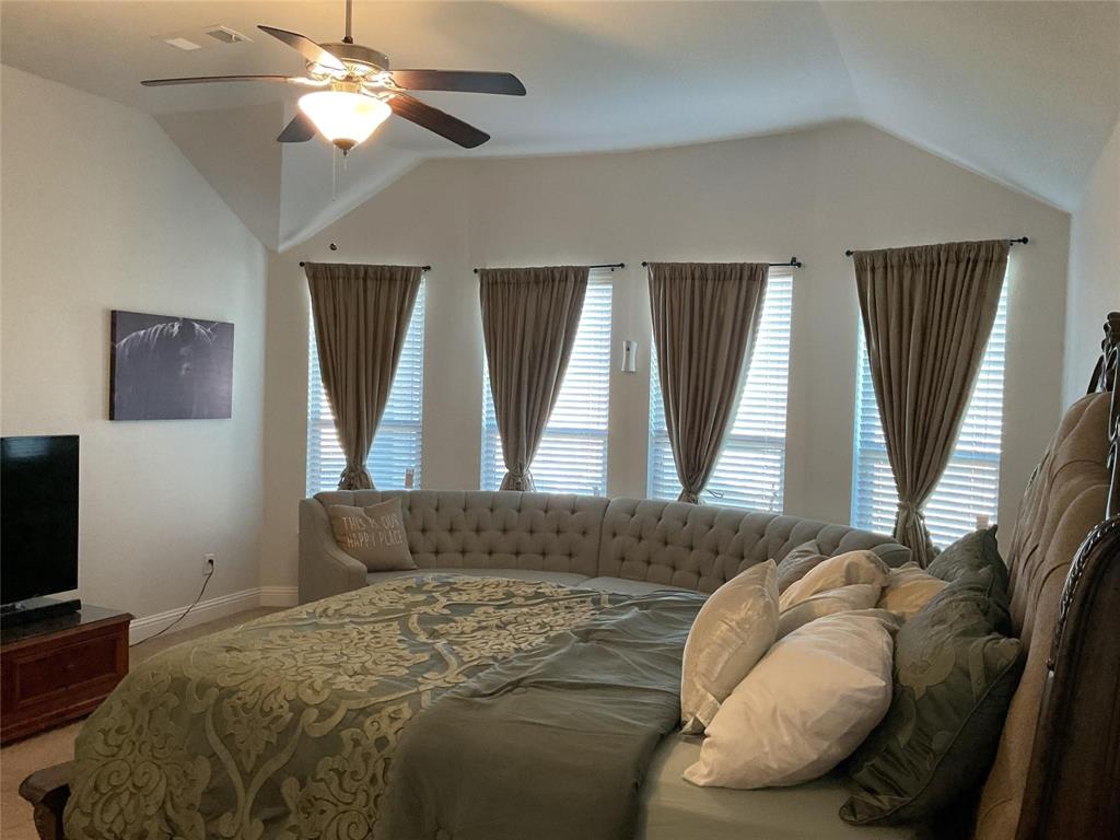 2805 Newsom Ridge Drive Mansfield, TX 76063 - Photo 23 of 33 a bedroom with a bed and window