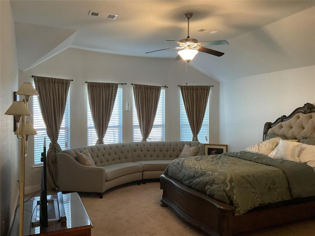 2805 Newsom Ridge Drive Mansfield, TX 76063 - Photo 24 of 33 a living room with a couch and a dresser