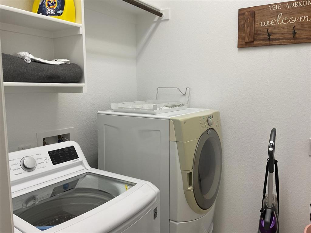 2805 Newsom Ridge Drive Mansfield, TX 76063 - Photo 28 of 33 a utility room with dryer and washer