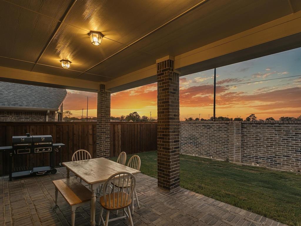 2805 Newsom Ridge Drive Mansfield, TX 76063 - Photo 31 of 33 a view of a chairs and table in patio