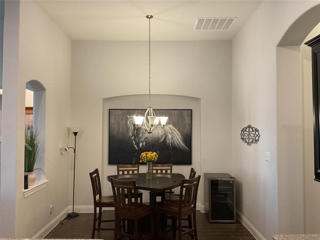 2805 Newsom Ridge Drive Mansfield, TX 76063 - Photo 7 of 33 a view of a dining room with furniture