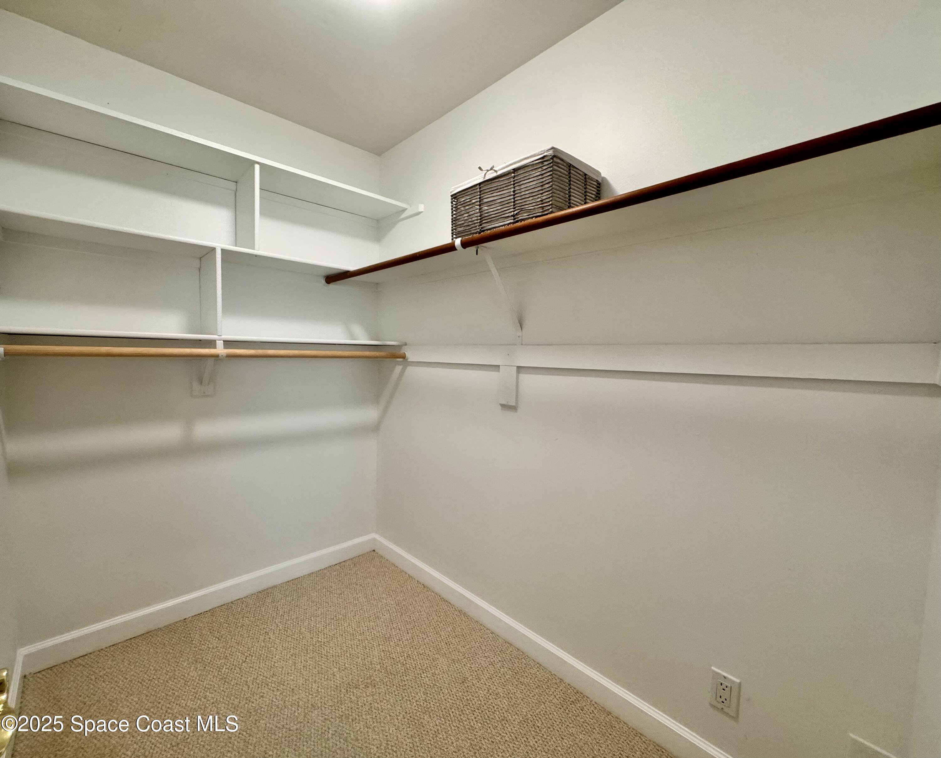 658 Ervin Street Sebastian, FL 32958 - Photo 19 of 36 a view of an empty walk in closet