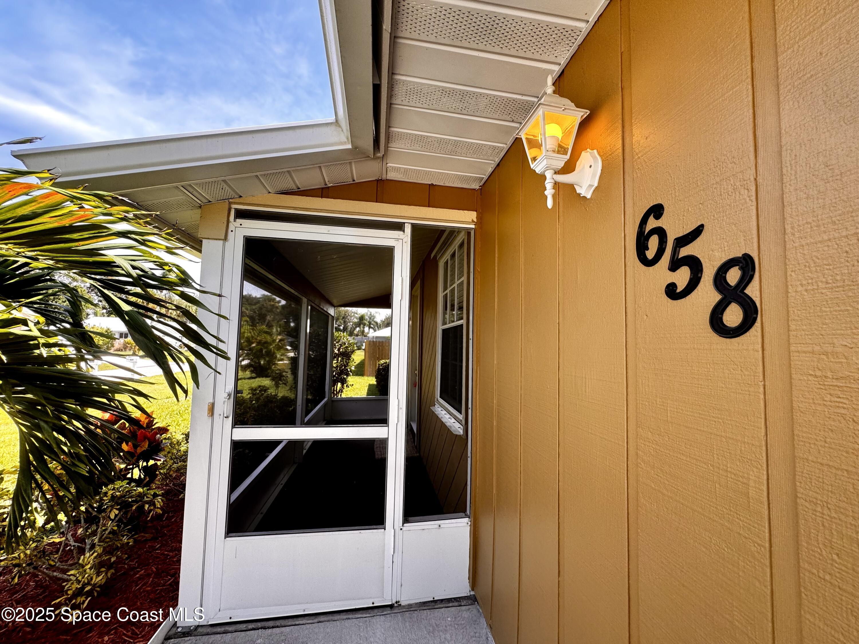 658 Ervin Street Sebastian, FL 32958 - Photo 4 of 36 a view of front door