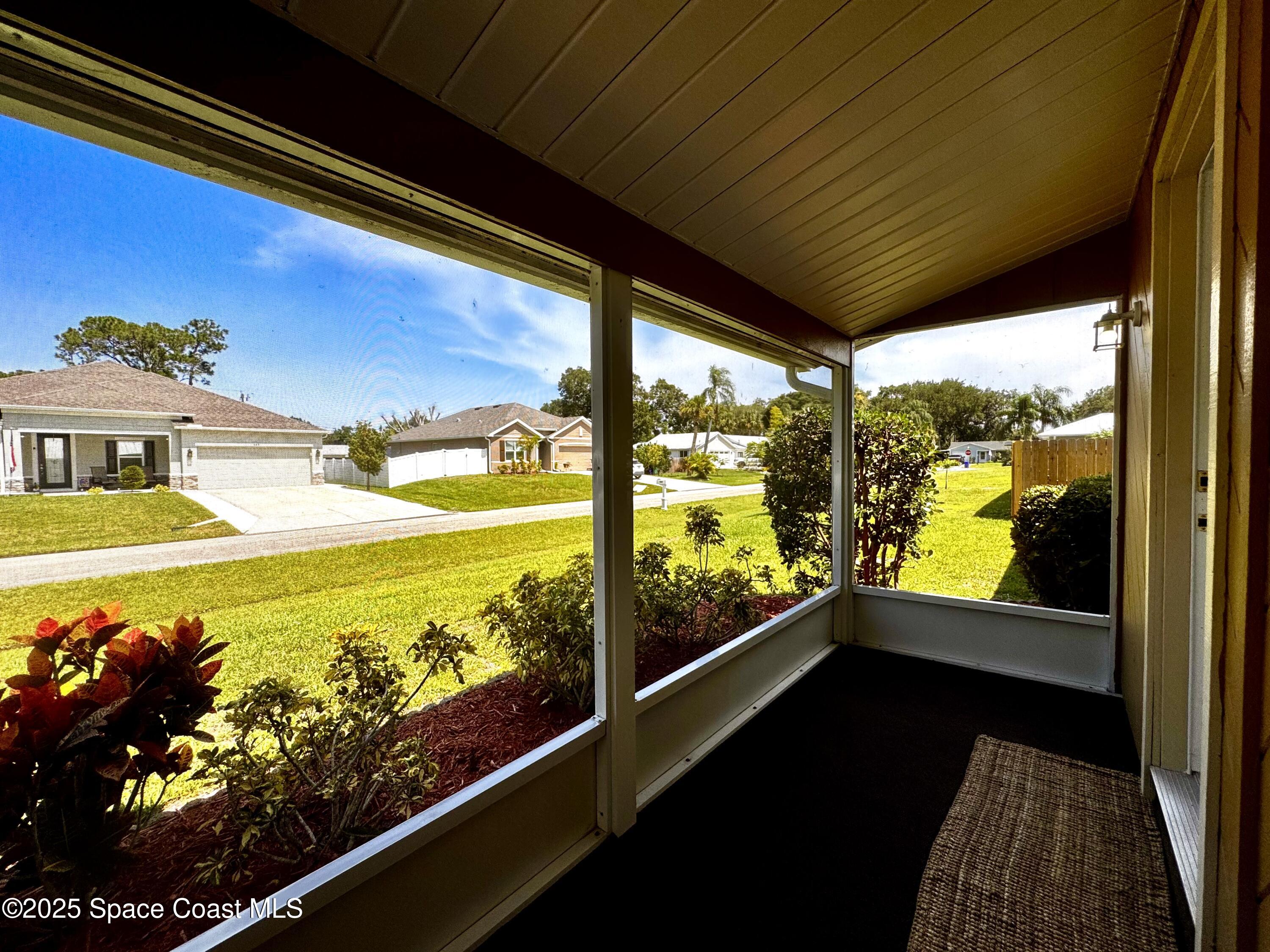 658 Ervin Street Sebastian, FL 32958 - Photo 8 of 36 a view of a balcony with an ocean view