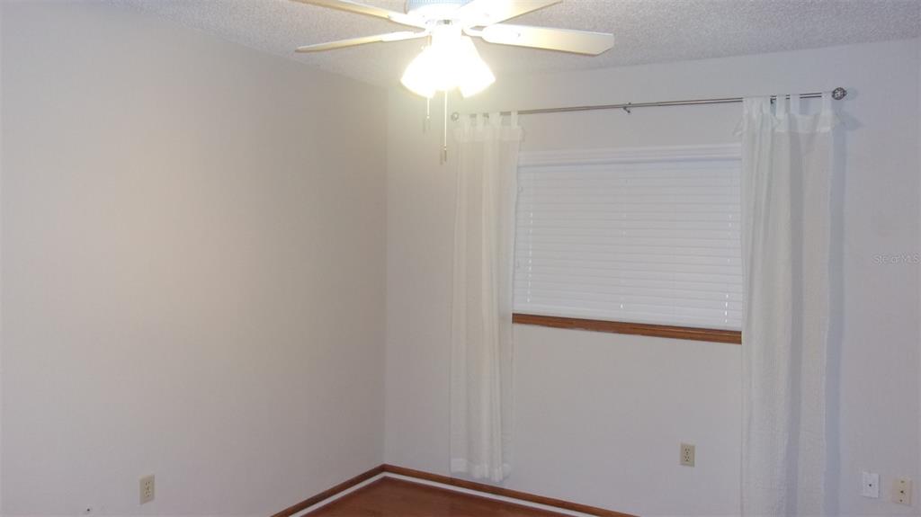 10015 Southwest 90th Court Ocala, FL 34481 - Photo 21 of 48 a small space with a window and a fan