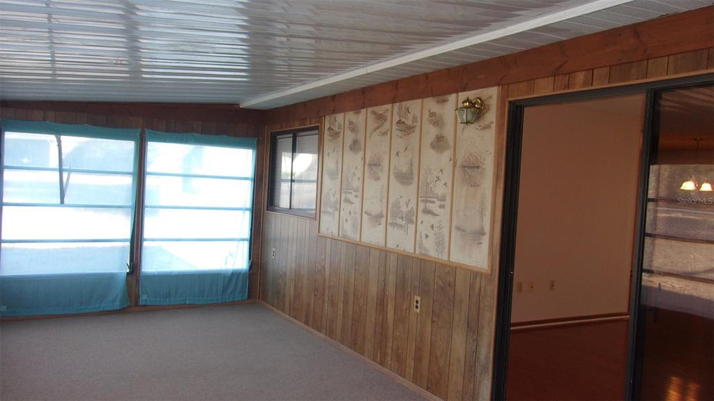 10015 Southwest 90th Court Ocala, FL 34481 - Photo 26 of 48 a view of empty room with windows