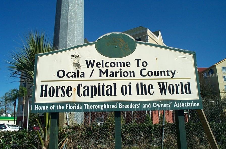 10015 Southwest 90th Court Ocala, FL 34481 - Photo 44 of 48 a sign on the side of a building