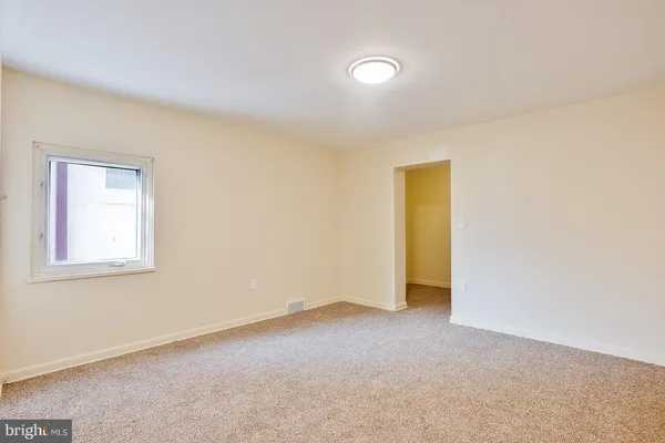 an empty room with a window