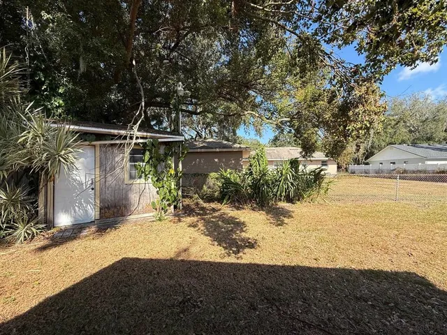 a view of a lake with a tree