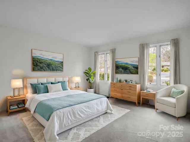 a bedroom with a bed and a couch