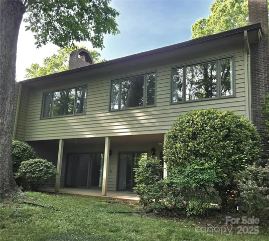 front view of a house with a small yard