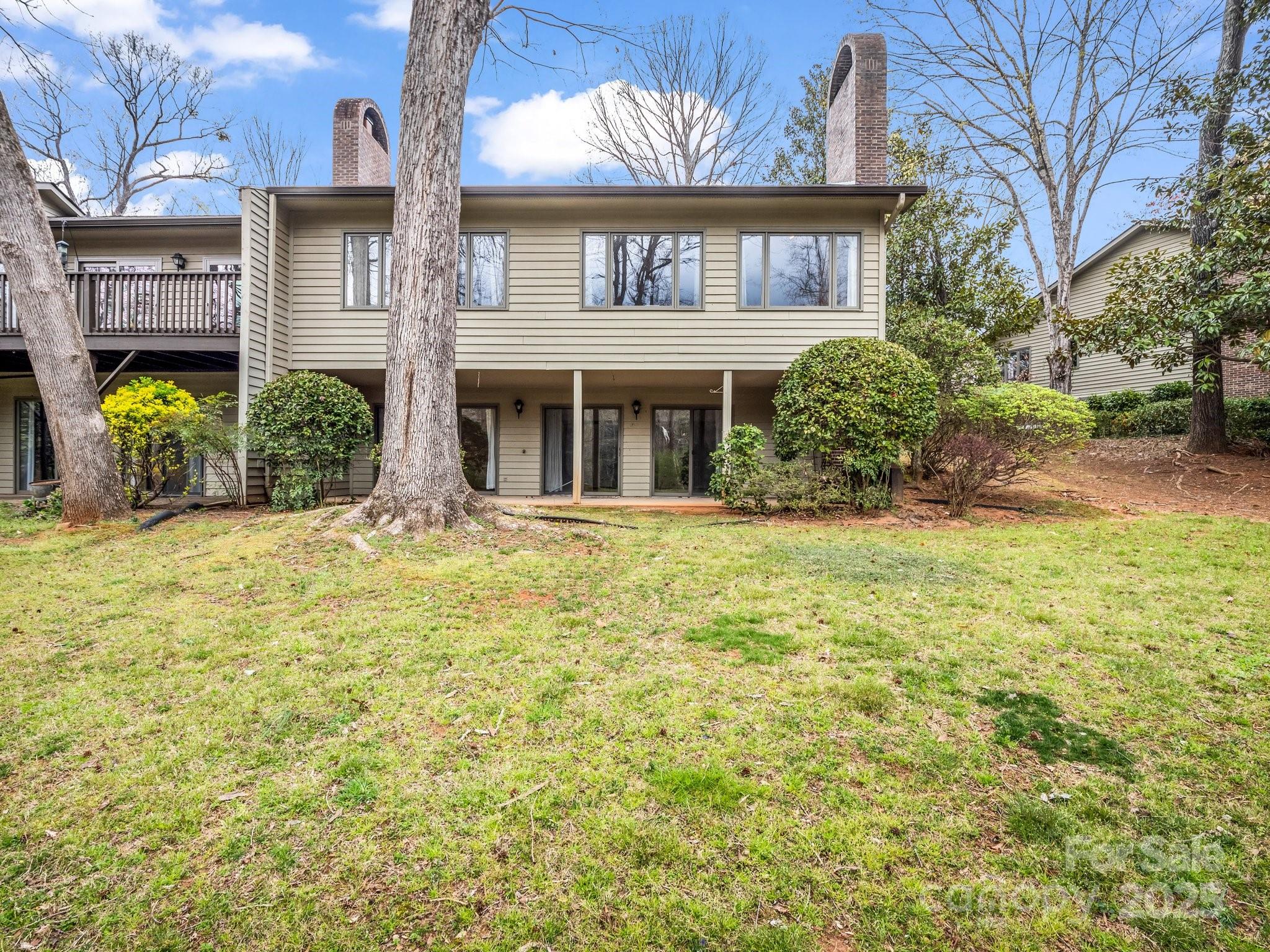 31 Hunting Country Trail Tryon, NC 28782 - Photo 40 of 40 a view of a house with many windows