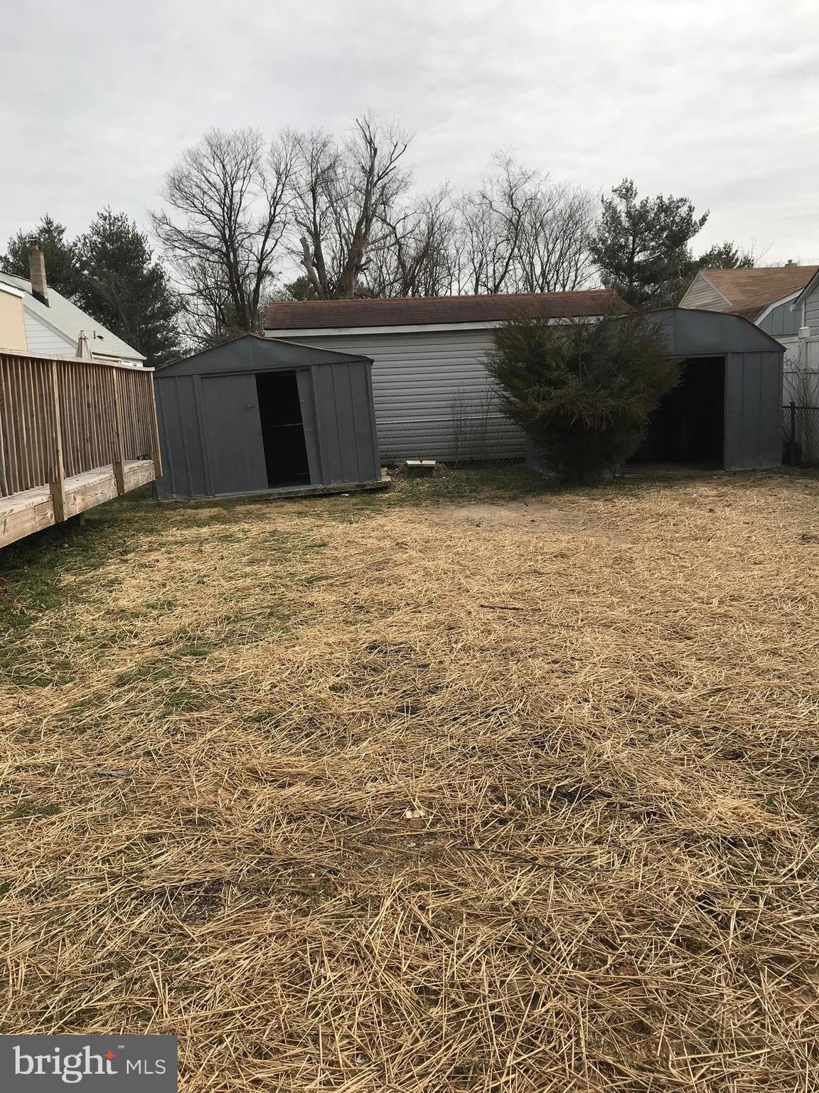 521 Cresswell Road Baltimore, MD 21225 - Photo 5 of 19 Back Yard and two sheds