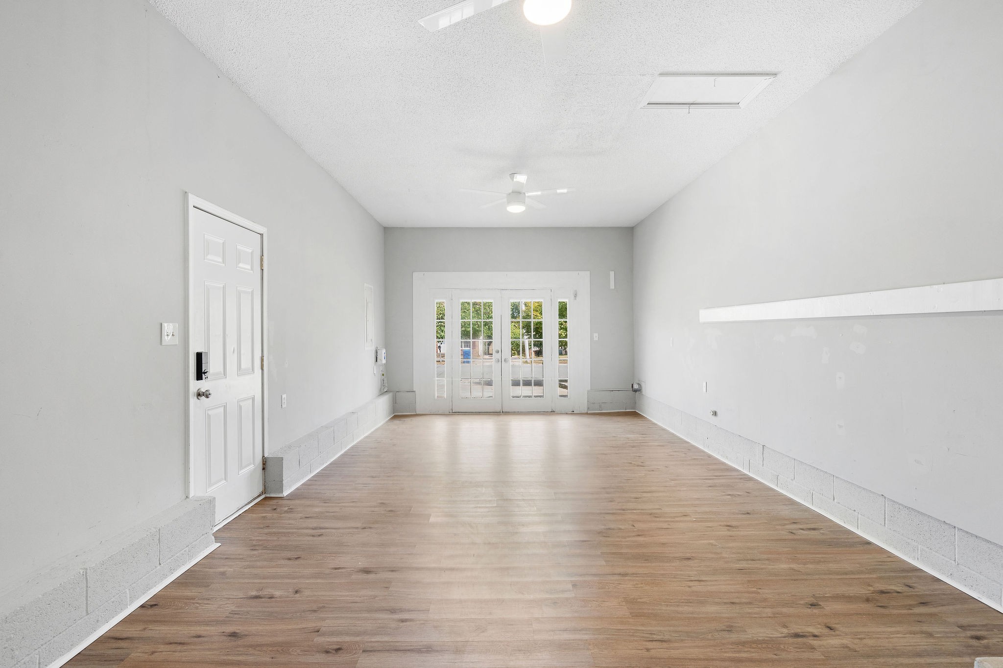 440 Cunningham Lane Clarksville, TN 37042 - Photo 20 of 42 wooden floor in an empty room with a window