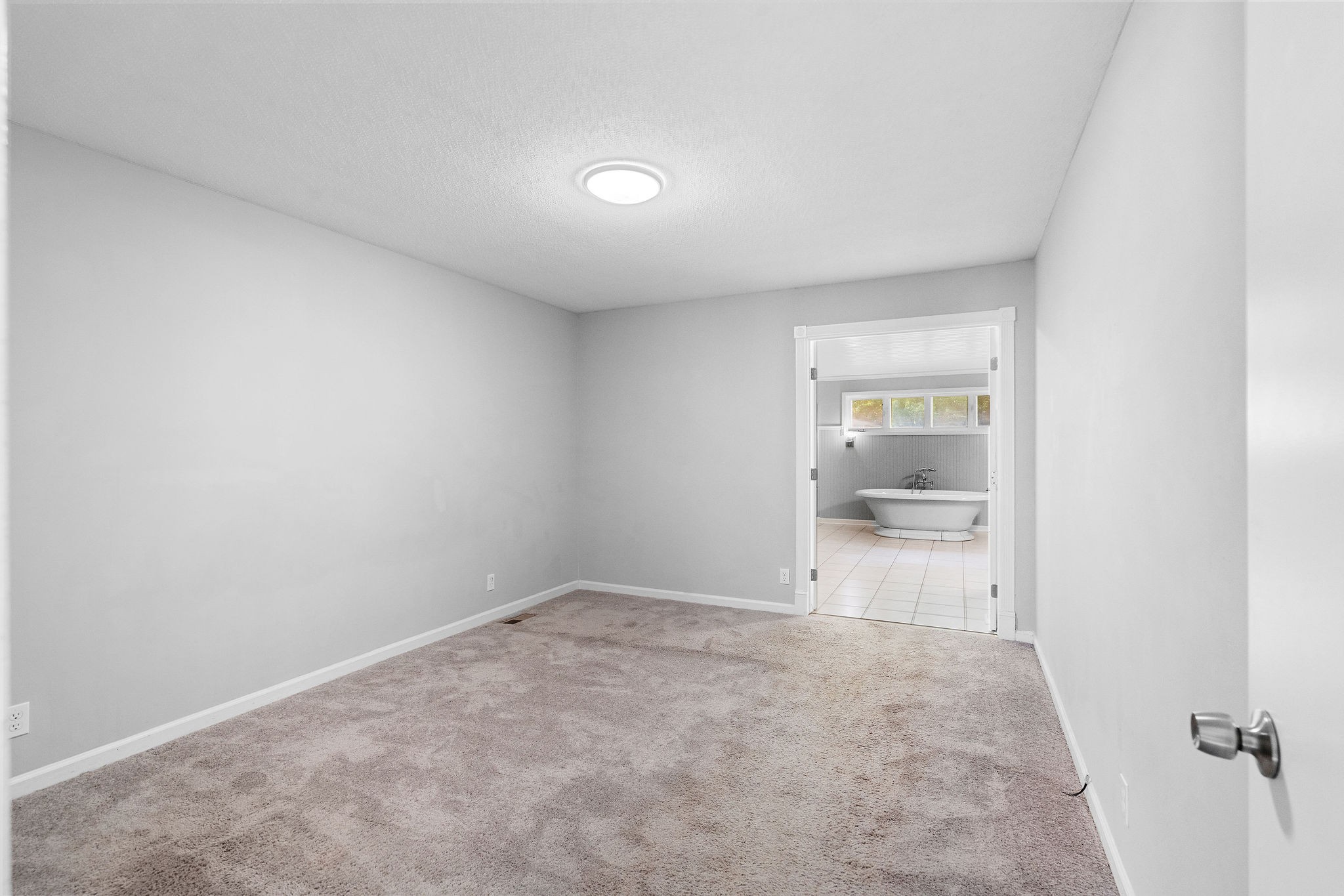 440 Cunningham Lane Clarksville, TN 37042 - Photo 23 of 42 a big room with wooden floor and bathroom view