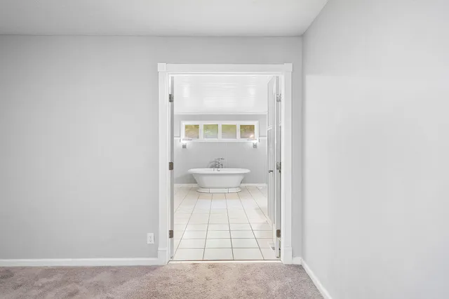 a view of a room that has a window