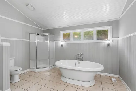 a bathroom with a toilet and a sink