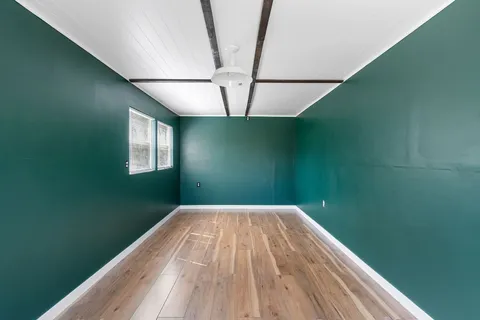 a view of a room with a window