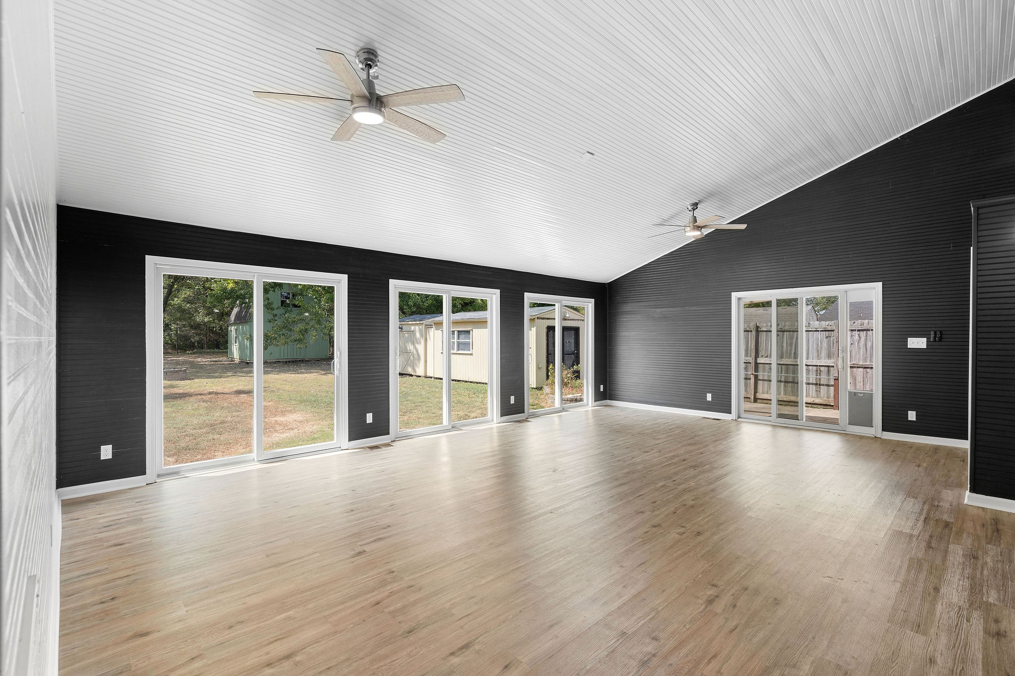 440 Cunningham Lane Clarksville, TN 37042 - Photo 4 of 42 a view of an empty room with wooden floor and a window