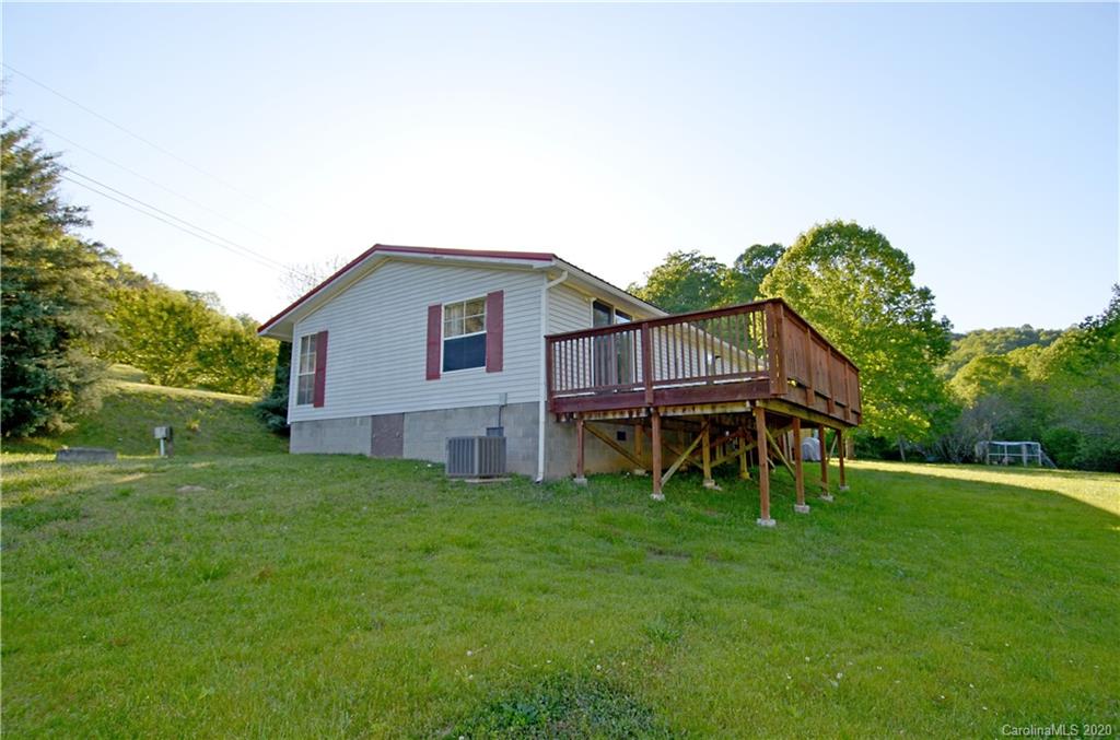 358 Toney Road Marion, NC 28752 - Photo 4 of 21 a view of a house with a yard