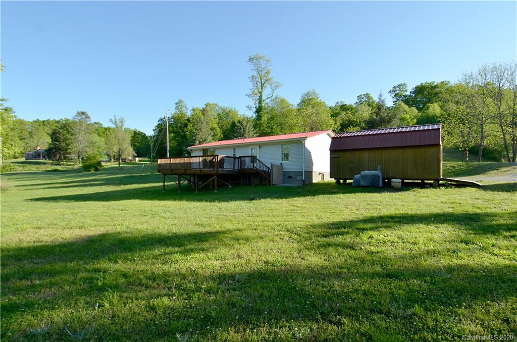 358 Toney Road Marion, NC 28752 - Photo 6 of 21 a view of a house with a backyard