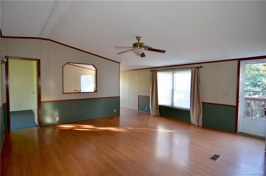 358 Toney Road Marion, NC 28752 - Photo 8 of 21 an empty room with windows and closet