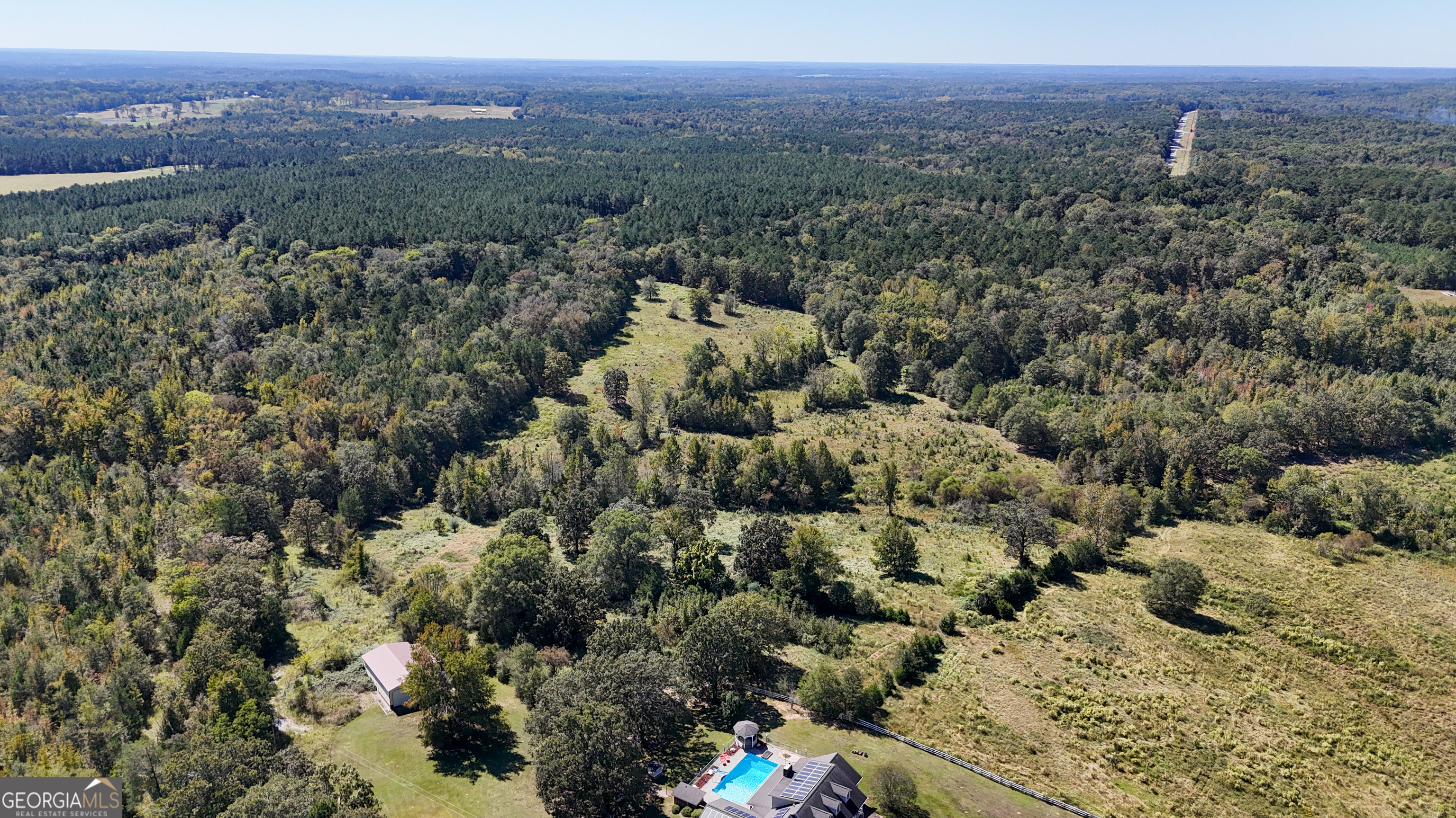 3 Calhoun Falls Highway Elberton, GA 30635 - Photo 11 of 14 an aerial view of a houses with a lush green hillside