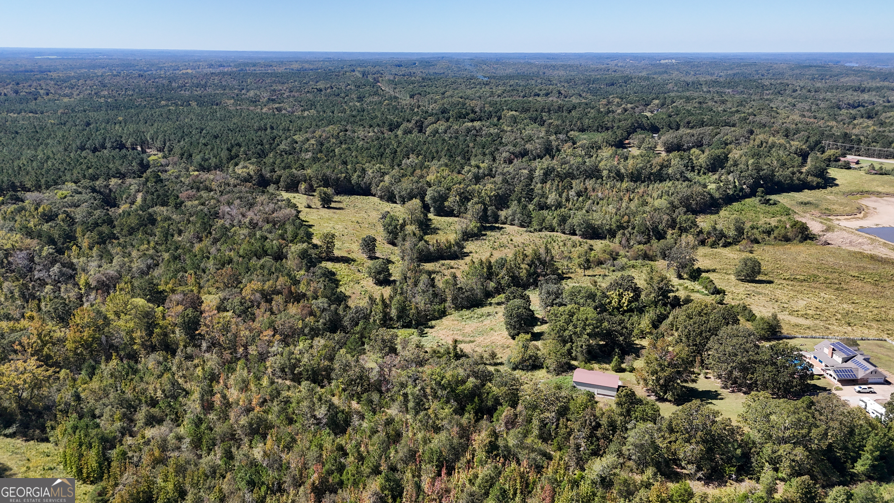 3 Calhoun Falls Highway Elberton, GA 30635 - Photo 13 of 14 a view of a city with lush green forest