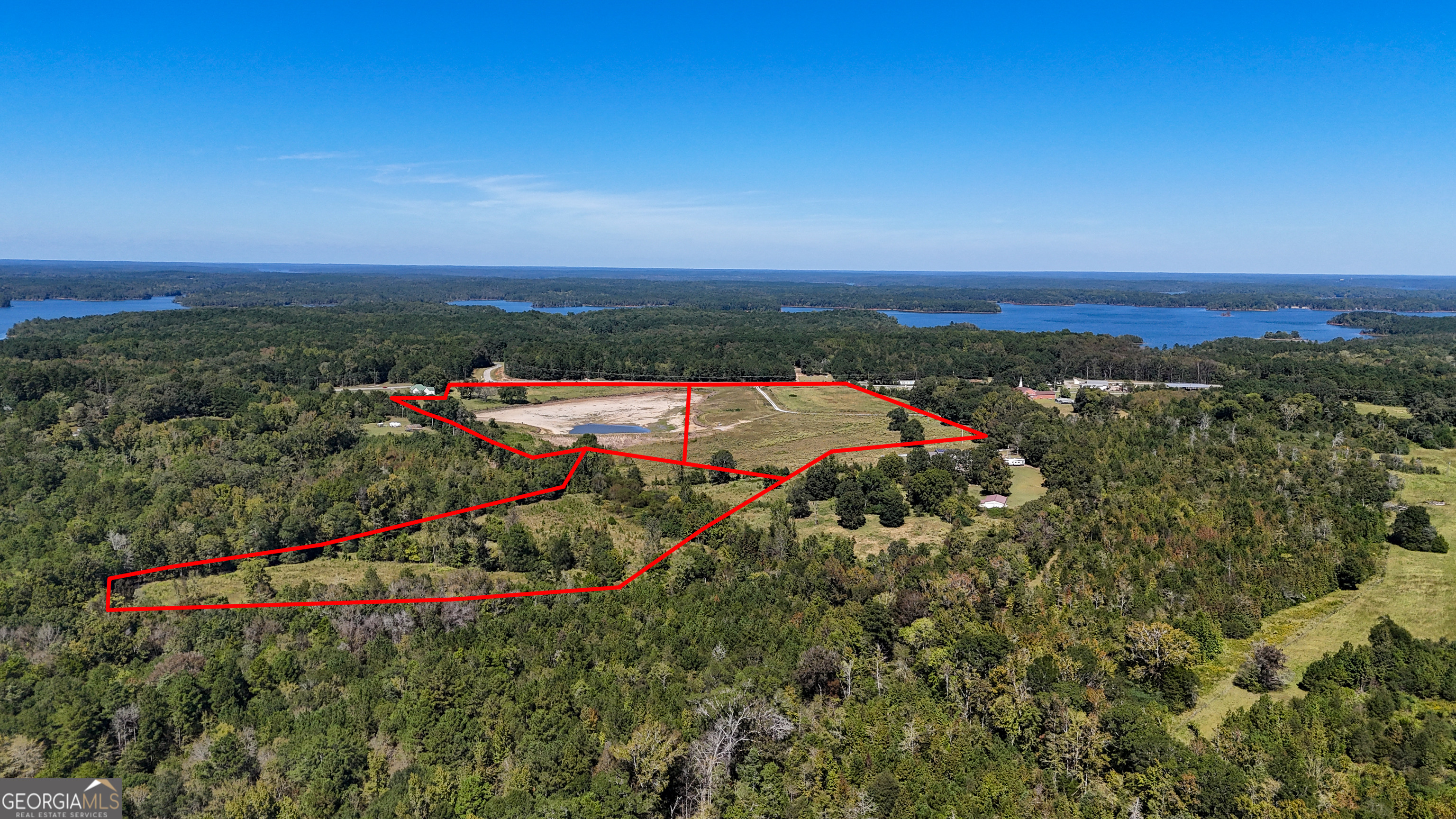 3 Calhoun Falls Highway Elberton, GA 30635 - Photo 2 of 14 an aerial view of a houses with a yard and lake view