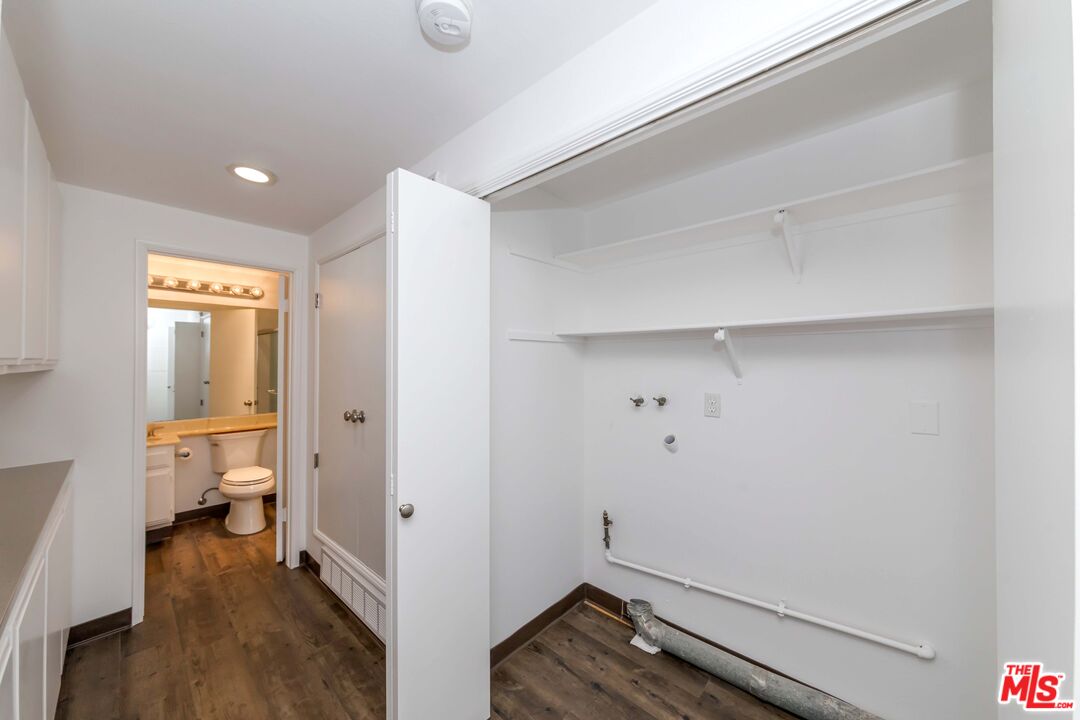 8180 Manitoba Street, Unit 248 Playa del Rey, CA 90293 - Photo 19 of 40 a view of room with wooden floor