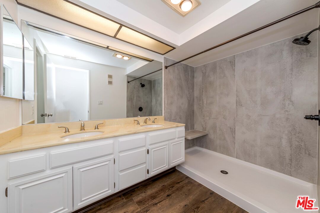 8180 Manitoba Street, Unit 248 Playa del Rey, CA 90293 - Photo 21 of 40 a bathroom with a tub sink and mirror