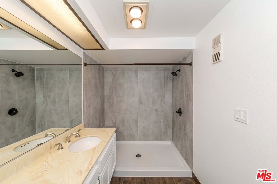 8180 Manitoba Street, Unit 248 Playa del Rey, CA 90293 - Photo 22 of 40 a bathroom with a sink and a shower