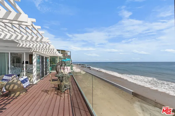 a view of swimming pool with lounge chair