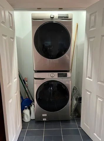 a utility room with dryer and washer
