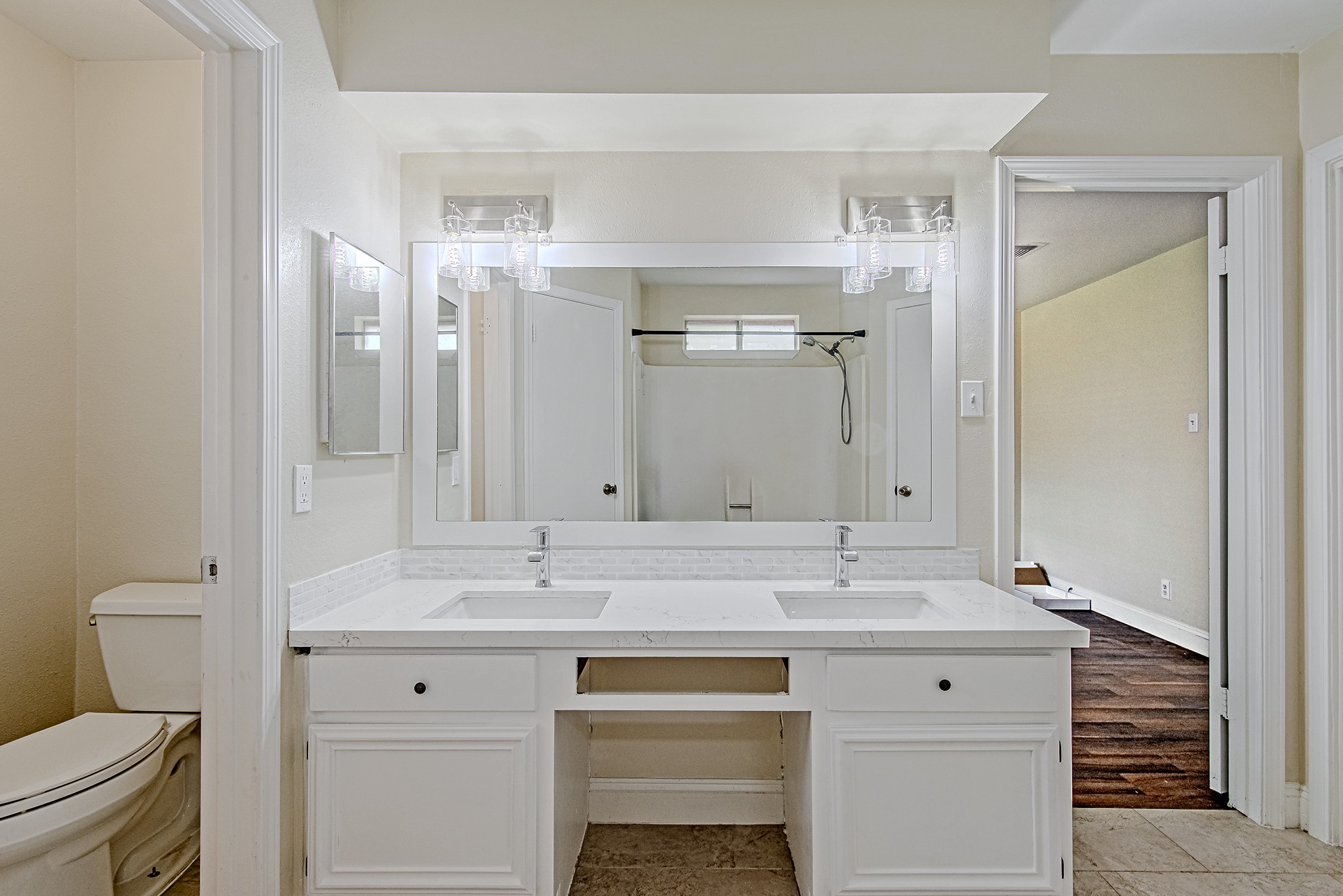 17811 Hawk Haven Lane Spring, TX 77379 - Photo 3 of 22 Well-lit vanity area with ample counter space and storage.