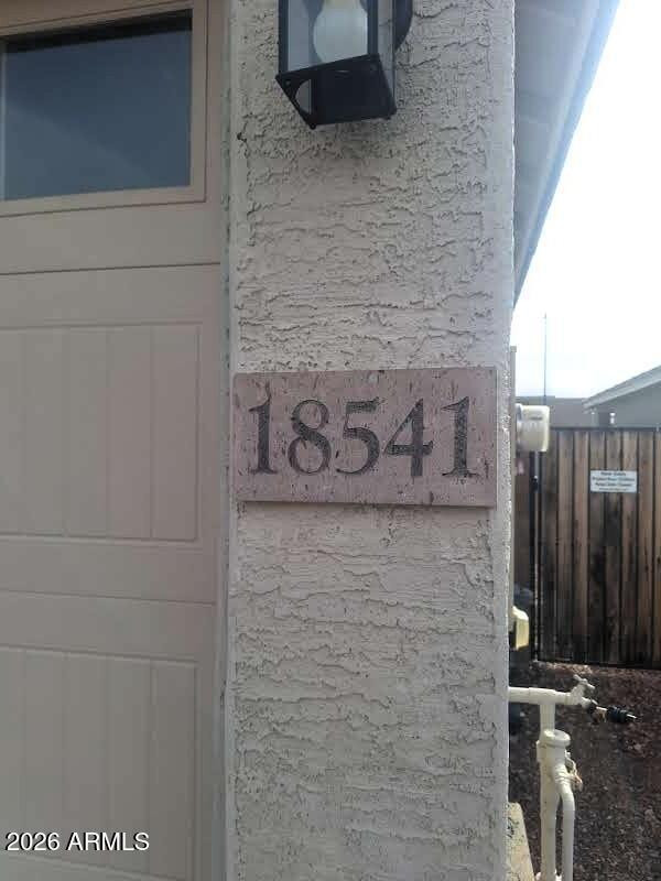 18541 West Mescal Street Surprise, AZ 85388 - Photo 5 of 31 a brick wall with a bathroom
