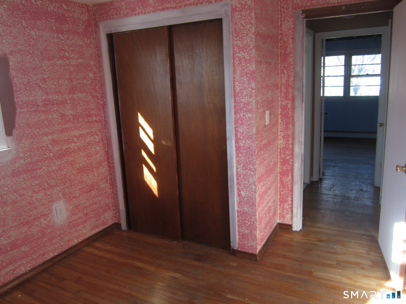 37 Graham Road East Hartford, CT 06118 - Photo 23 of 26 a view of an entryway door with wooden floor