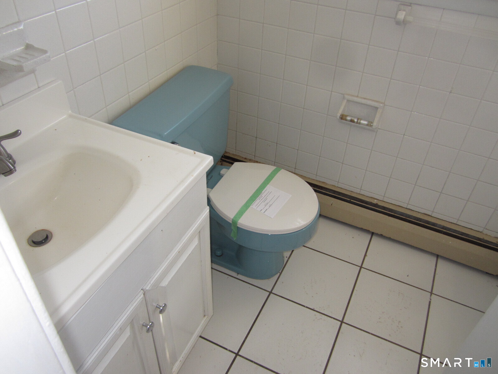 37 Graham Road East Hartford, CT 06118 - Photo 24 of 26 a bathroom with a sink and toilet