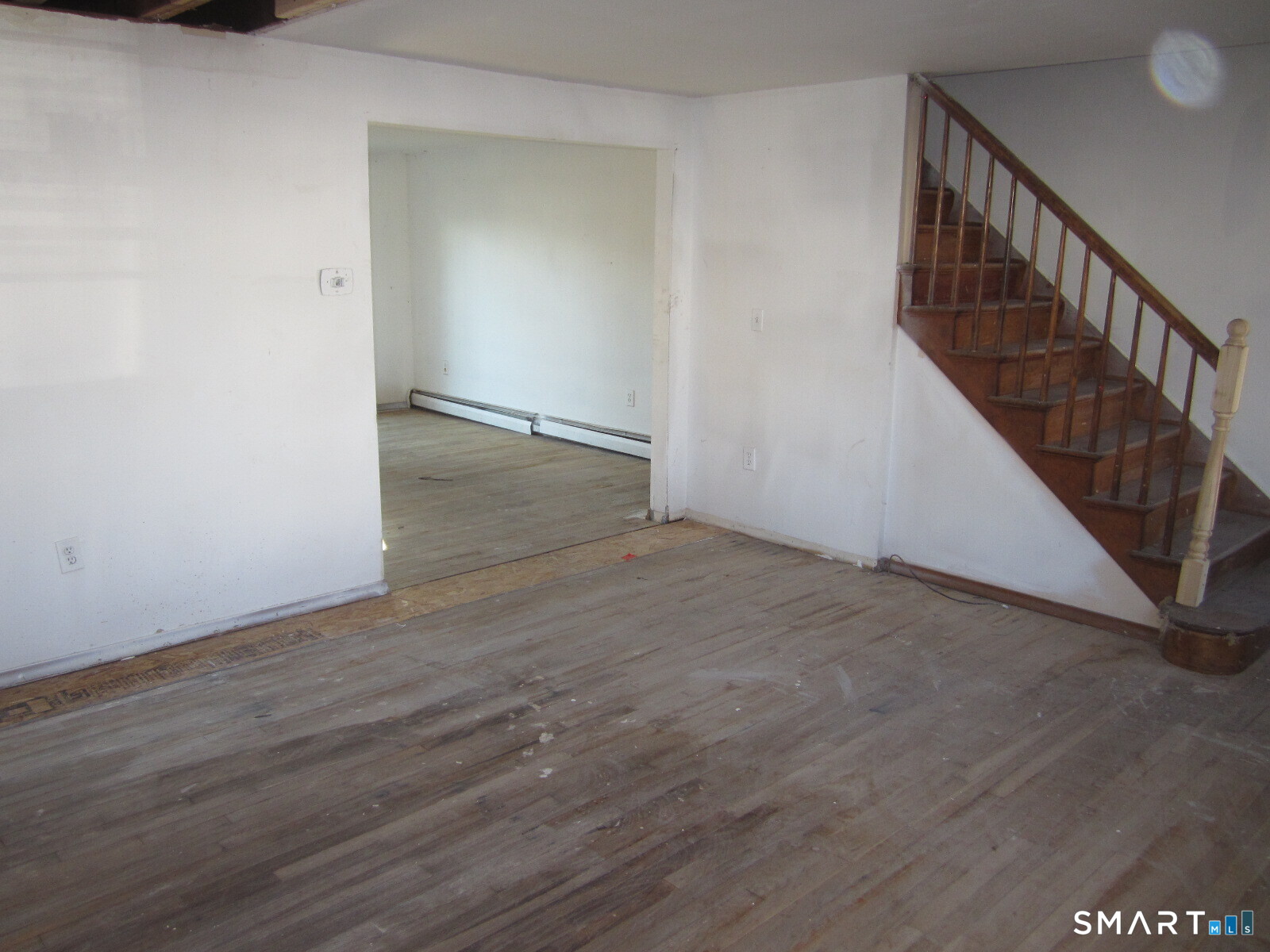 37 Graham Road East Hartford, CT 06118 - Photo 5 of 26 a view of an entryway with wooden floor