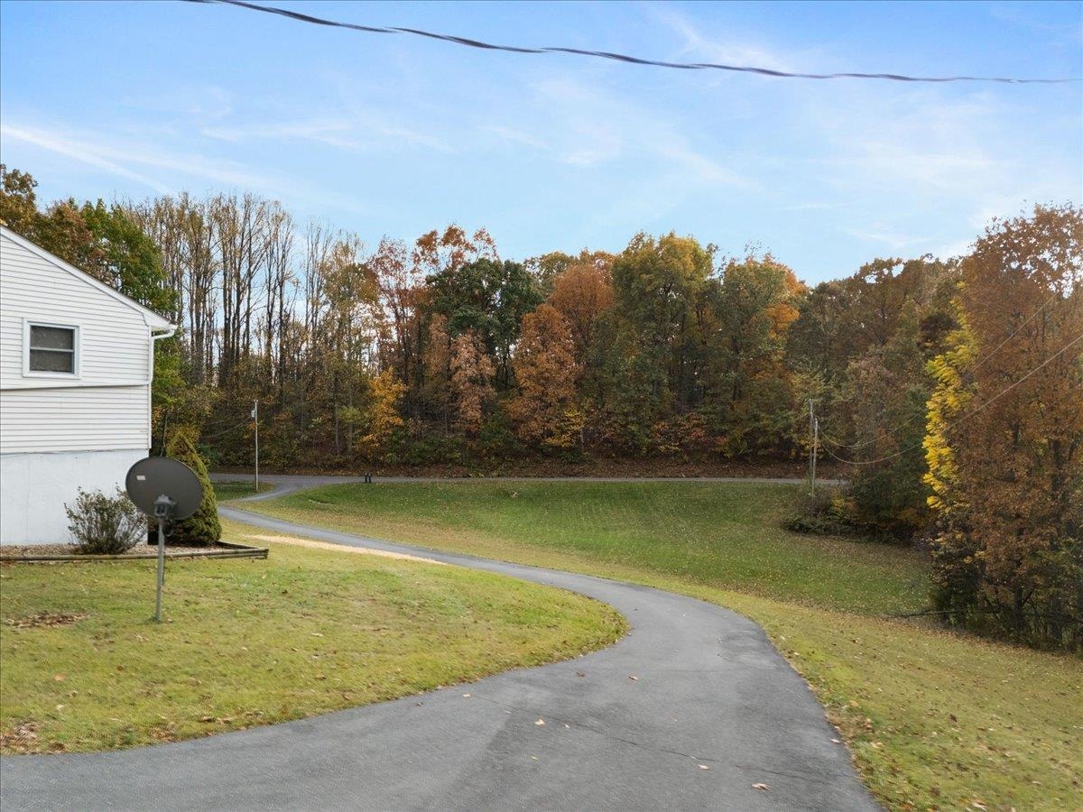 9508 Koontz Corner Road Harrisonburg, VA 22802 - Photo 17 of 55 a view of a swimming pool with an outdoor space and seating area
