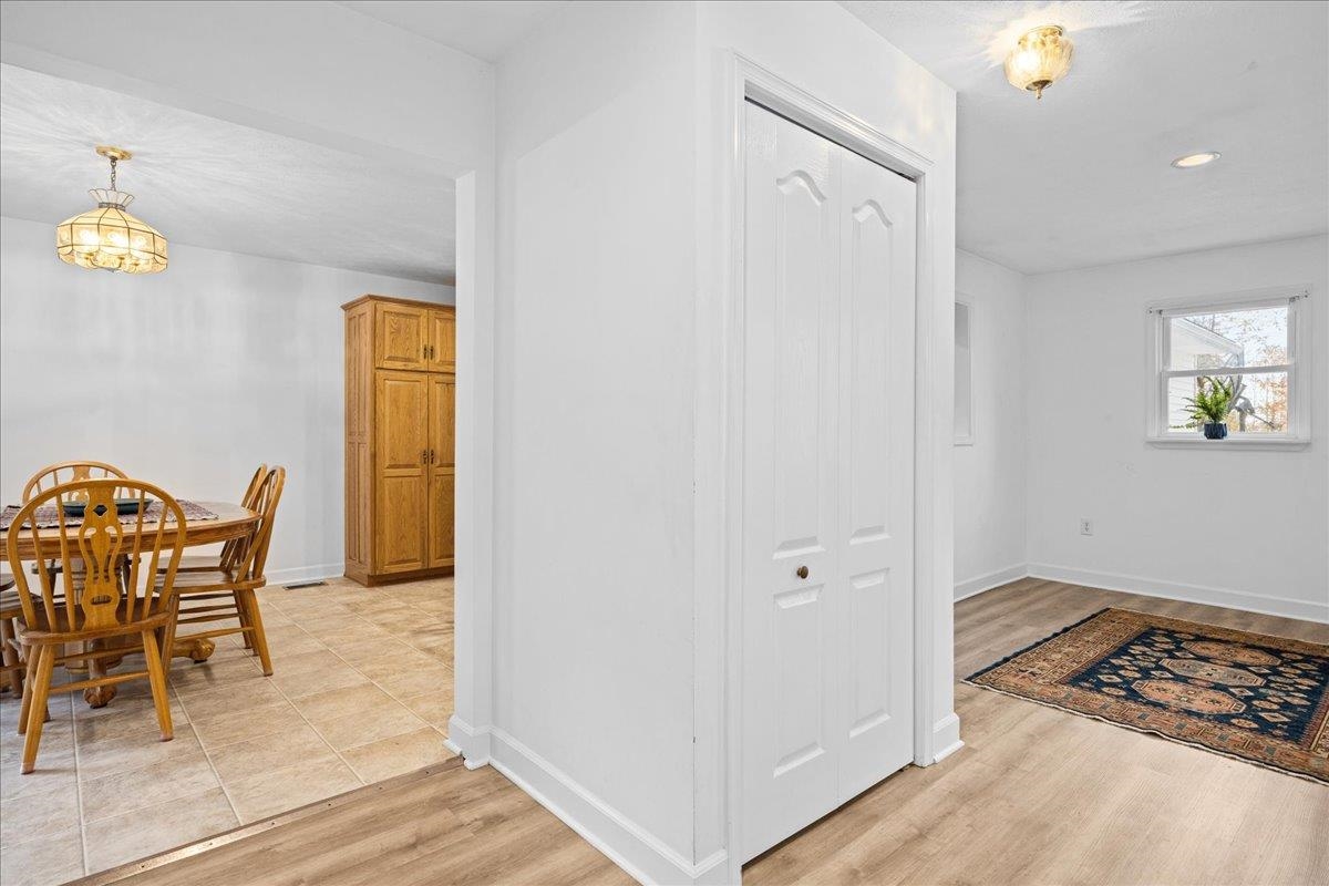 9508 Koontz Corner Road Harrisonburg, VA 22802 - Photo 18 of 55 a view of a dining room with a table and chairs