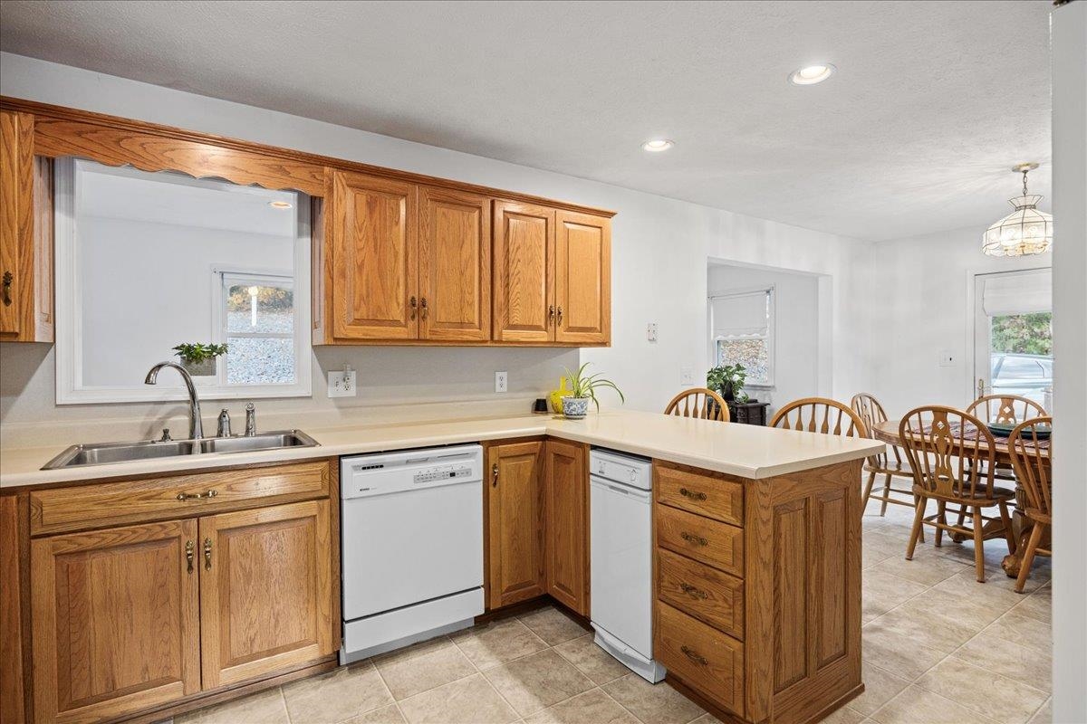 9508 Koontz Corner Road Harrisonburg, VA 22802 - Photo 24 of 55 a kitchen with a sink stove and cabinets