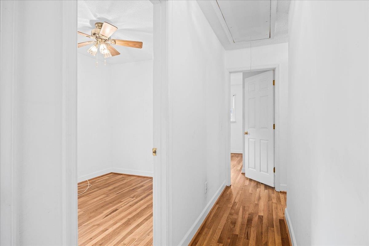 9508 Koontz Corner Road Harrisonburg, VA 22802 - Photo 26 of 55 a view of a hallway with wooden floor