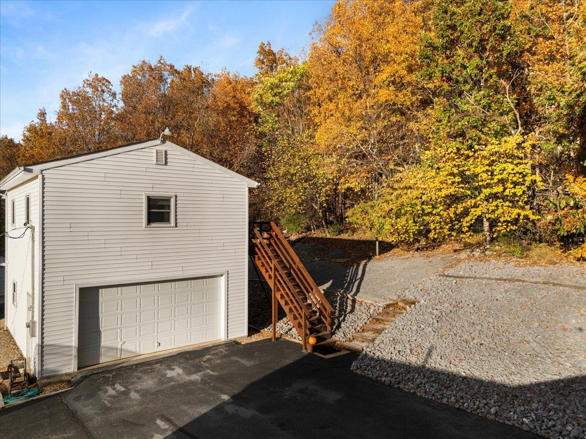 9508 Koontz Corner Road Harrisonburg, VA 22802 - Photo 40 of 55 a house with trees in front of it