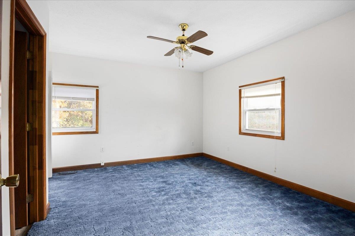 9508 Koontz Corner Road Harrisonburg, VA 22802 - Photo 45 of 55 an empty room with fan and windows
