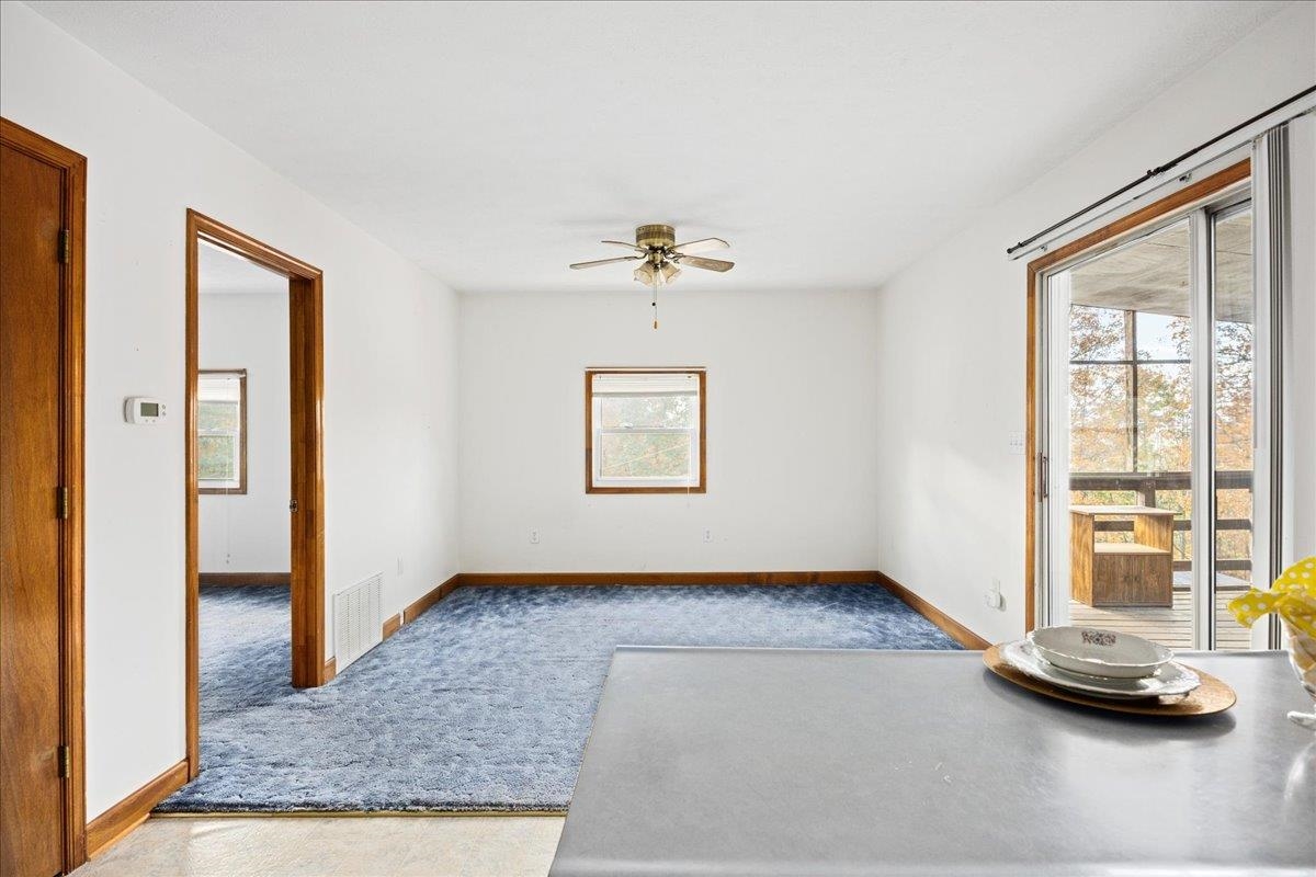 9508 Koontz Corner Road Harrisonburg, VA 22802 - Photo 48 of 55 a view of a livingroom with a furniture and a window