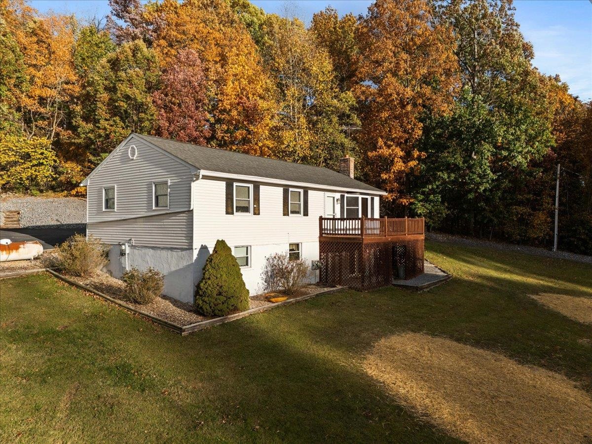 9508 Koontz Corner Road Harrisonburg, VA 22802 - Photo 9 of 55 a backyard of a house with table and chairs
