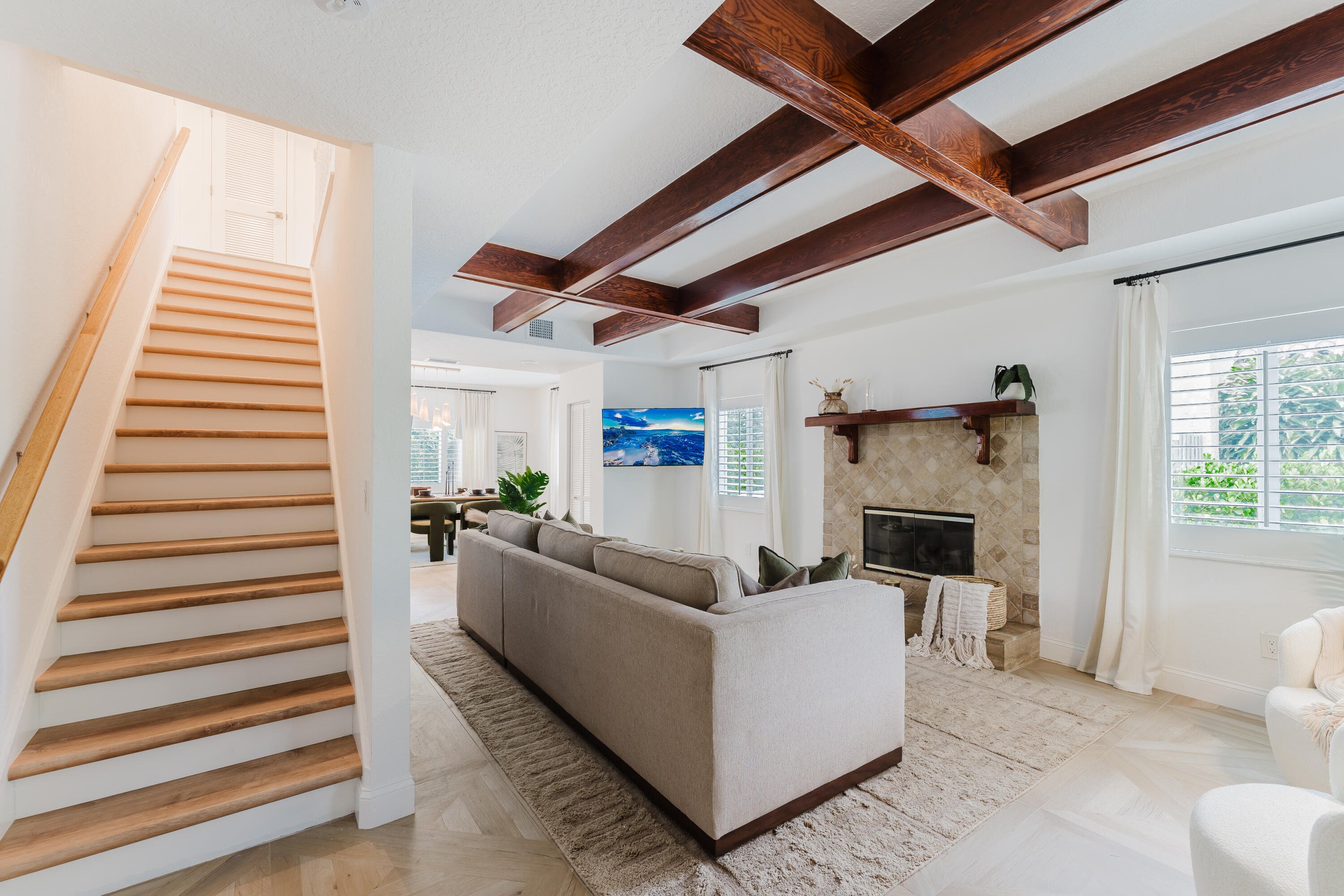 921 Ortega Road West Palm Beach, FL 33405 - Photo 6 of 60 a living room with furniture and a fireplace